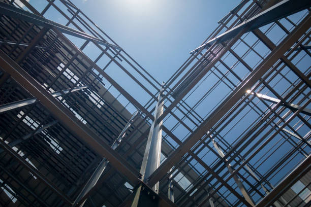 Construction of building on sky background